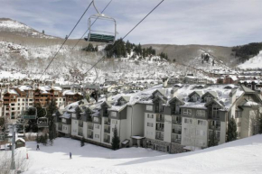 Upscale Ski in, Ski out 1 Bedroom Mountain Vacation Rental with Access to Outdoor Heated Pool, Hot Tubs, and Private Ski Lockers